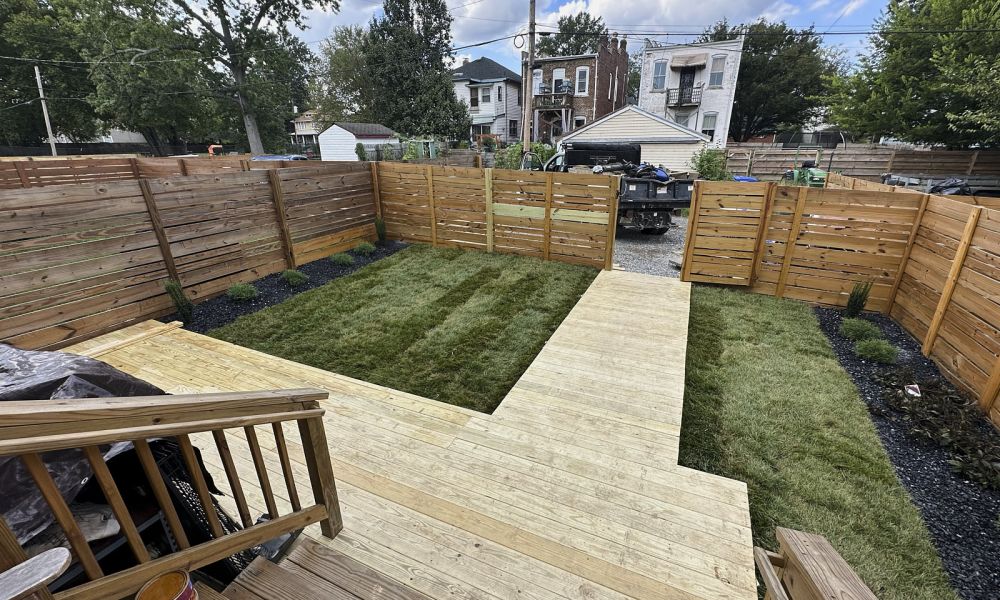 Garden with wooden pathways showcasing excellent landscaping